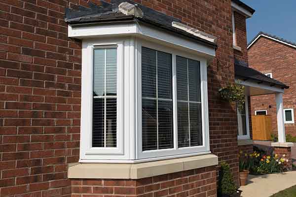 upvc window with white internal georgian bars